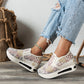 Blommigt mönstrade sneakers i broderad mesh
