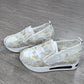 Blommigt mönstrade sneakers i broderad mesh