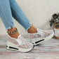 Blommigt mönstrade sneakers i broderad mesh
