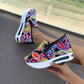 Blommigt mönstrade sneakers i broderad mesh