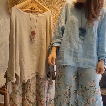 Set med löst sittande blus och blommiga byxor med vida ben för kvinnor